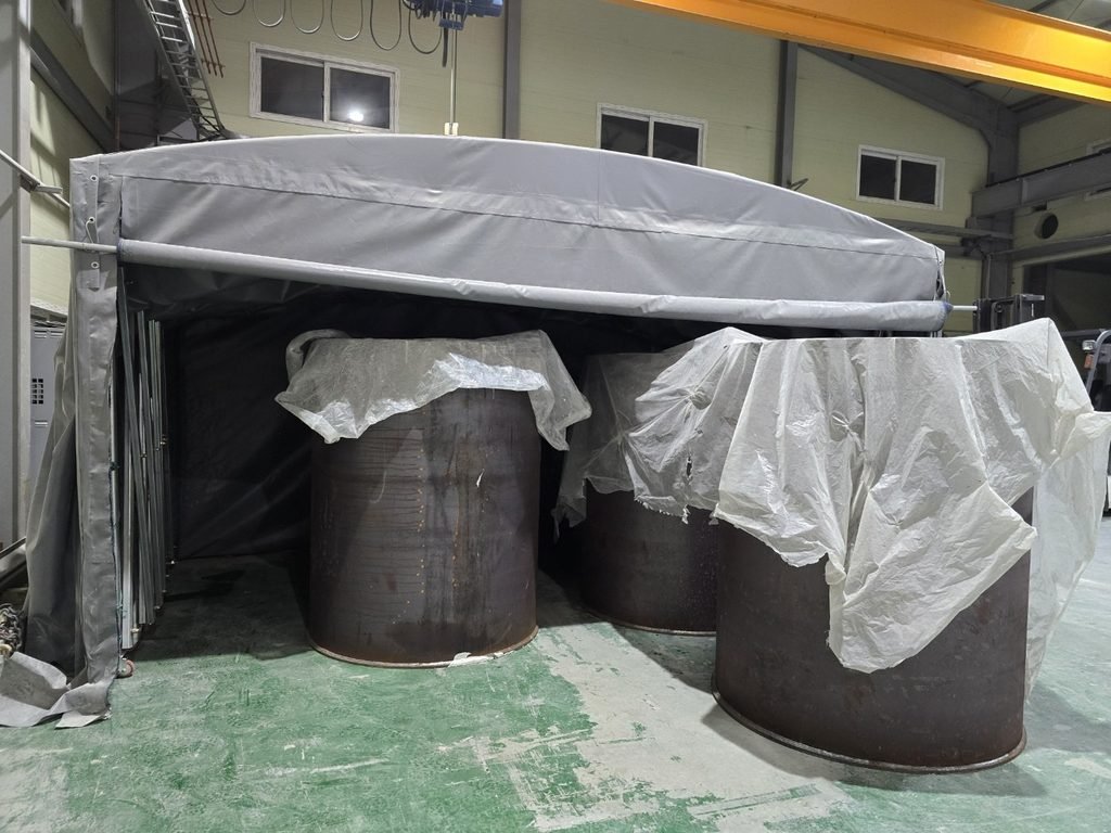 UHPC test cylinders curing at the plant